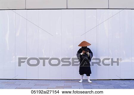 Japan, Tokyo, Ginza, Monk Collecting Alms View Large Photo Image Picture - Japan, Tokyo, Ginza, Monk Collecting Alms. Fotosearch