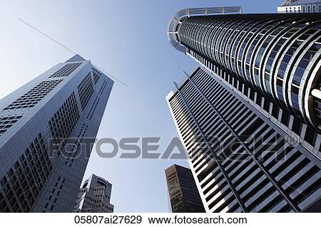 Stock Photo - low angle shot of Singapore skyscrapers. Fotosearch