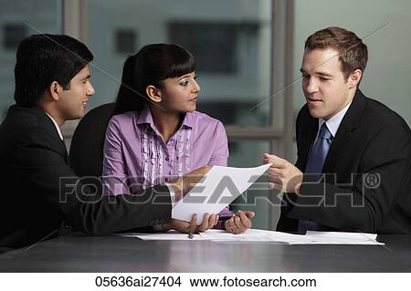 mixed raced group talking business View Large Photo Image Picture - mixed raced group talking business. Fotosearch