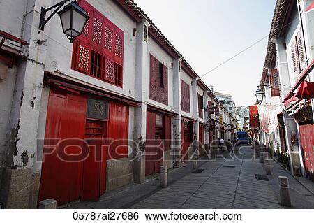 Narrow street with red doors in Macau View Large Photo Image Stock Photograph - Narrow street with red doors in Macau. Fotosearch