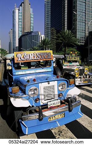 Philippines, Manila, Jeepneys in the Makati Financial District View Large Photo Image Picture - Philippines, Manila, Jeepneys in the Makati Financial District. Fotosearch