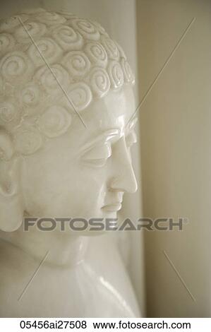 Profile of a Buddha's face carved in stone. View Large Photo Image Stock Photo - Profile of a Buddha's face carved in stone.. Fotosearch