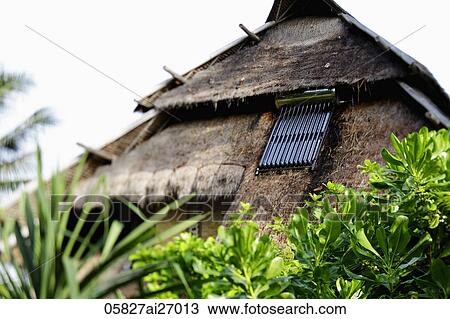 solar panel on thatched hut View Large Photo Image Stock Image - solar panel on thatched hut. Fotosearch