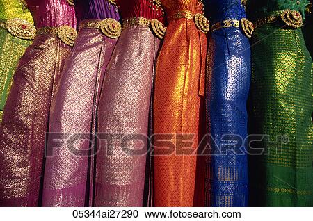 Stock Image - Thailand, Bangkok, Traditional Silk Dresses. Fotosearch