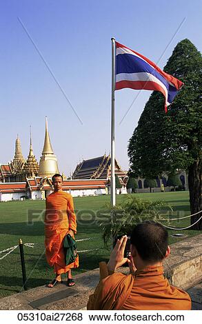 Stock Photo - Thailand, Bangkok, Wat Phra Kaeo, Monks Taking Photos in Wat Phra Kaeo. Fotosearch