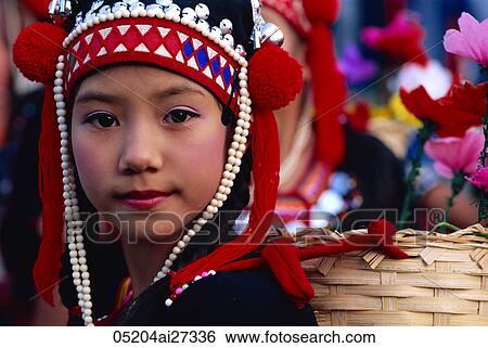 Thailand, Chiang Rai, Akha Hilltribe Girl Wearing Traditional Silver Headpiece View Large Photo Image Stock Photograph - Thailand, Chiang Rai, Akha Hilltribe Girl Wearing Traditional Silver Headpiece. Fotosearch