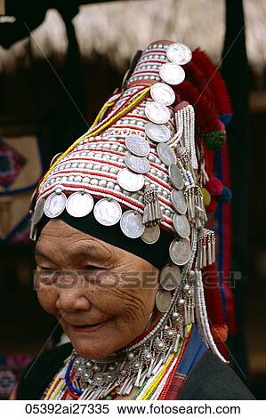 Thailand, Chiang Rai, Akha Hilltribe Woman Wearing Traditional Silver Headpiece View Large Photo Image Stock Photography - Thailand, Chiang Rai, Akha Hilltribe Woman Wearing Traditional Silver Headpiece. Fotosearch
