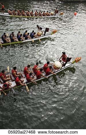 Three dragon boats getting ready to race View Large Photo Image Stock Photo - Three dragon boats getting ready to race. Fotosearch