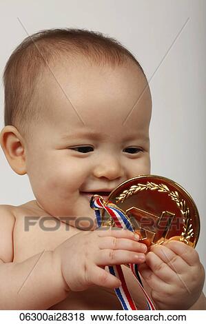 Baby holding gold medal View Large Photo Image Stock Photo - Baby holding gold medal. Fotosearch
