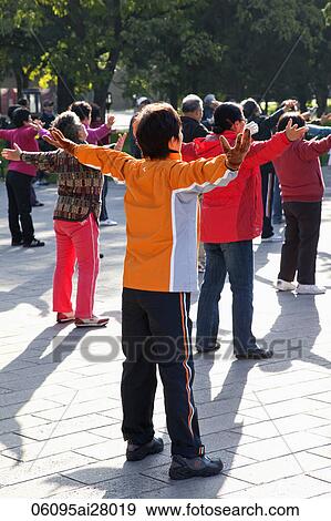 Stock Photo - China, Beijing, Summer Palace Park, Woman Exercising. Fotosearch