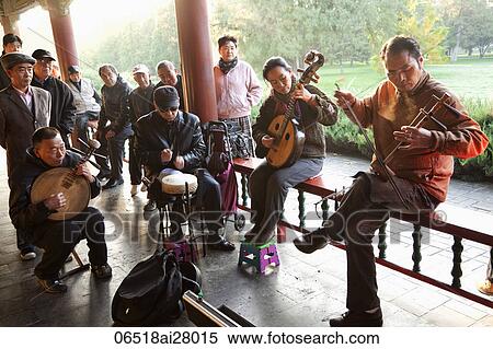China, Beijing, Temple of Heaven Park, Group Playing Traditional Chinese Stringed Instruments View Large Photo Image Stock Photography - China, Beijing, Temple of Heaven Park, Group Playing Traditional Chinese Stringed Instruments. Fotosearch