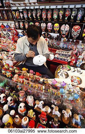 China, Beijing, The Silk Market, Artist Painting Chinese Mask View Large Photo Image Stock Photography - China, Beijing, The Silk Market, Artist Painting Chinese Mask. Fotosearch