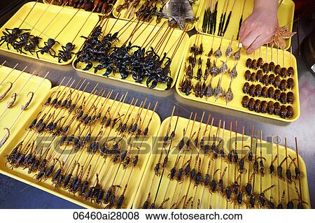 Stock Photo - China, Beijing, Wangfujing Street, Snack Street Market selling Insects and Scorpians. Fotosearch