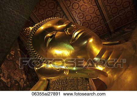 Close up of gold reclining Buddha at Wat Pho, Thailand View Large Photo Image Stock Image - Close up of gold reclining Buddha at Wat Pho, Thailand. Fotosearch