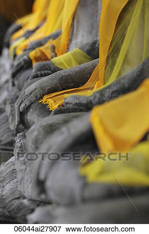 Close up of hands of stone Buddhas at Wat Yai Chaya Mongkol Temple, Thailand View Large Photo Image Stock Photo - Close up of hands of stone Buddhas at Wat Yai Chaya Mongkol Temple, Thailand. Fotosearch
