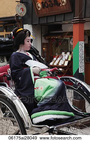Geisha in Rickshaw in front of Asakusa Kannon Temple. Japan, Tokyo View Large Photo Image Stock Photo - Geisha in Rickshaw in front of Asakusa Kannon Temple. Japan, Tokyo. Fotosearch