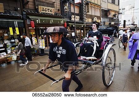 Geisha in Rickshaw on busy street. Japan, Tokyo View Large Photo Image Stock Image - Geisha in Rickshaw on busy street. Japan, Tokyo. Fotosearch