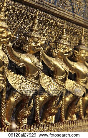 Gold statues at Grand Palace, Bangkok Thailand View Large Photo Image Stock Photo - Gold statues at Grand Palace, Bangkok Thailand. Fotosearch