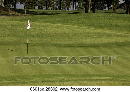 Golf course green with 8th hole flag. View Large Photo Image Stock Image - Golf course green with 8th hole flag.. Fotosearch