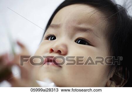 Head shot of baby View Large Photo Image Stock Image - Head shot of baby. Fotosearch