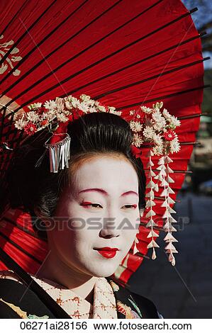 Head shot of Geisha with red umbrella View Large Photo Image Stock Photograph - Head shot of Geisha with red umbrella. Fotosearch