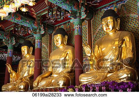 Stock Image - Jogyesa Temple, Daeungjeon or Hall of the Great Hero, Buddha Statues, Seoul, Korea. Fotosearch