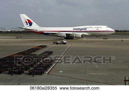 Malaysian airlines airplane preparing for take off View Large Photo Image Stock Photography - Malaysian airlines airplane preparing for take off. Fotosearch