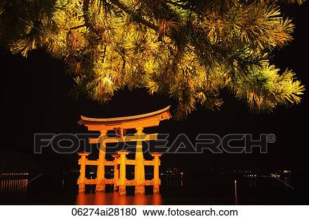 Stock Image - Miyajima Island, Itsukushima Shrine, Torii Gate at night. Japan. Fotosearch