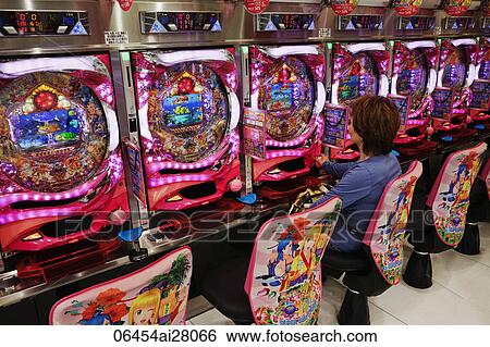 Person playing Pachinko machine. Japan, Tokyo, Shinjuku, View Large Photo Image Stock Photograph - Person playing Pachinko machine. Japan, Tokyo, Shinjuku,. Fotosearch