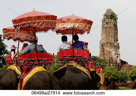 Rear shot of tourist riding elephants at Ayutthaya, Thailand View Large Photo Image Picture - Rear shot of tourist riding elephants at Ayutthaya, Thailand. Fotosearch