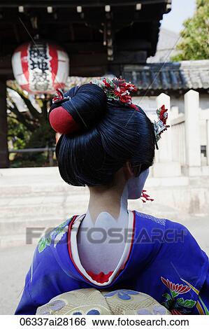 Rear view of Japanese woman wearing Kimono and traditional hair and makup View Large Photo Image Stock Photograph - Rear view of Japanese woman wearing Kimono and traditional hair and makup. Fotosearch