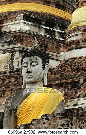 Stock Image - Stone Buddha at Wat Yai Chaya Mongkol Temple, Thailand. Fotosearch