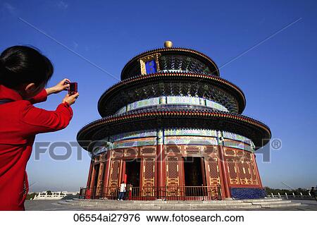 Temple of Heaven or Tiantan, Girl Taking Photo of Hall of Prayer for Good Harvests. Beijing, China View Large Photo Image Stock Photograph - Temple of Heaven or Tiantan, Girl Taking Photo of Hall of Prayer for Good Harvests. Beijing, China. Fotosearch