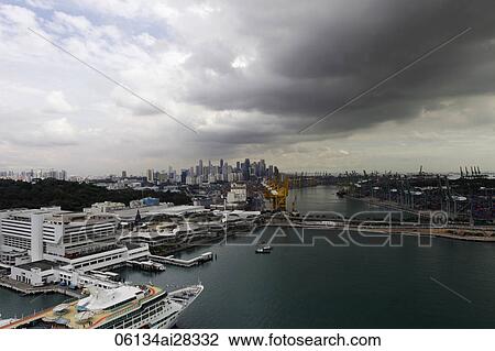 Stock Image - Yacht entering Singapore Harbour. Fotosearch