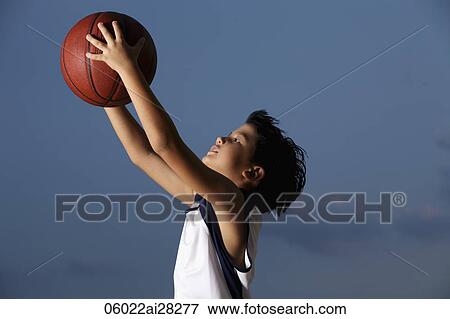 Young boy catching basket ball View Large Photo Image Stock Photo - Young boy catching basket ball. Fotosearch