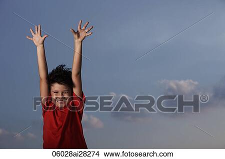 young boy with red shirt smiling with hands outstretched View Large Photo Image Picture - young boy with red shirt smiling with hands outstretched. Fotosearch