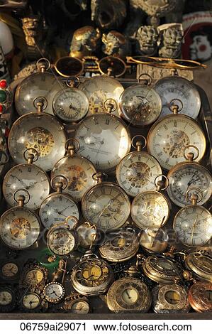 Stock Image - Antique watches for sale in market in Shanghai, China. Fotosearch