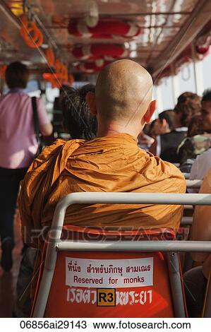 Buddhist Monk in Special Seat on Riverboat, Bangkok, Thailand View Large Photo Image Stock Image - Buddhist Monk in Special Seat on Riverboat, Bangkok, Thailand. Fotosearch