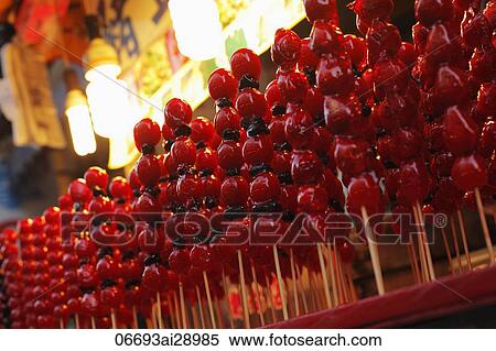 Candied Haw (crab apples) for sale in night market, Taiwan View Large Photo Image Stock Photography - Candied Haw (crab apples) for sale in night market, Taiwan. Fotosearch
