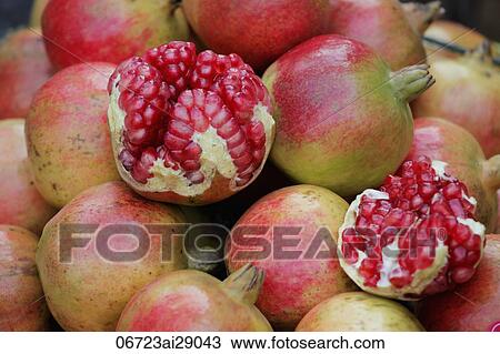 Close up of pomegranates in market in China View Large Photo Image Stock Image - Close up of pomegranates in market in China. Fotosearch