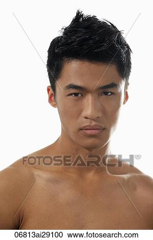 Stock Image - Head shot of shirtless young man. Fotosearch