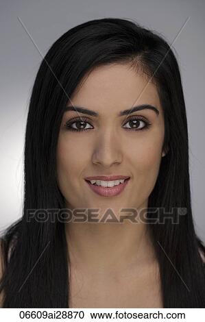 Head shot of young woman smiling View Large Photo Image Stock Image - Head shot of young woman smiling. Fotosearch