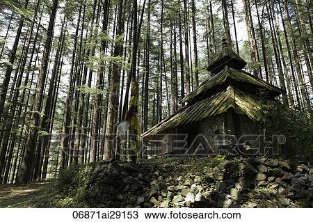 Stock Image - Hindu Temple in a forest of the Himalayan Mountains. India. Fotosearch