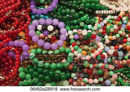 Stock Photo - Jade bracelets at the Jade Market. Hong Kong, China. Fotosearch