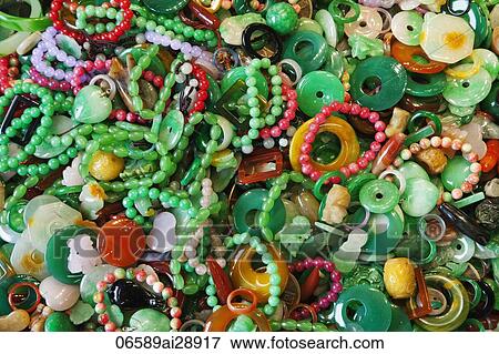 Jade jewelry at the Jade Market, Hong Kong, China View Large Photo Image Stock Photo - Jade jewelry at the Jade Market, Hong Kong, China. Fotosearch