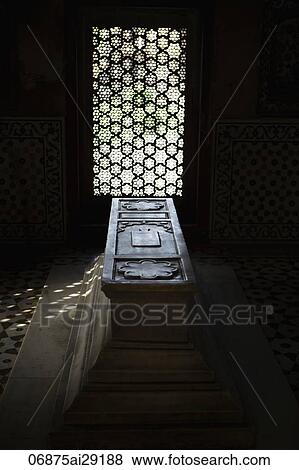 Light coming though carved stone window onto a tomb. Itmad-Ud-Daulah's Tomb, Agra, India View Large Photo Image Stock Photo - Light coming though carved stone window onto a tomb. Itmad-Ud-Daulah's Tomb, Agra, India. Fotosearch