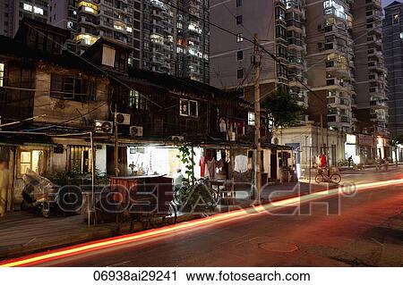 Light trail from a car on a street in Shanghai at night, China View Large Photo Image Stock Image - Light trail from a car on a street in Shanghai at night, China. Fotosearch