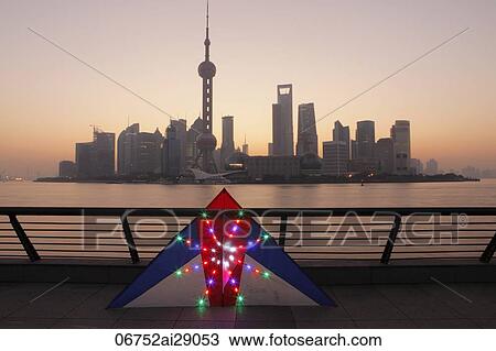 Lit kite with skyline of Shanghai in background, China View Large Photo Image Stock Image - Lit kite with skyline of Shanghai in background, China. Fotosearch