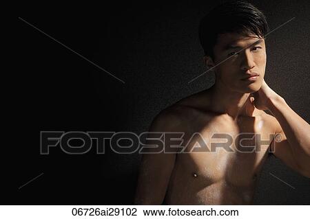 Portrait of shirtless young man View Large Photo Image Stock Image - Portrait of shirtless young man. Fotosearch