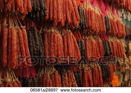 Preserved sausages hanging in a market. View Large Photo Image Stock Photo - Preserved sausages hanging in a market.. Fotosearch